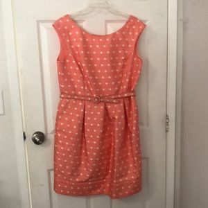 Pink with white dress matching belt makes it look classy